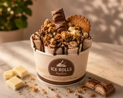 Papillon. White chocolate, biscuit, Bueno & chocolate syrup.